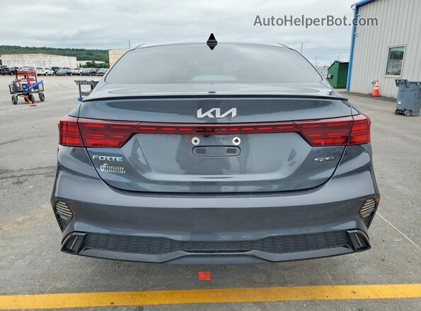 3KPF54AD9PE663346 2023 KIA FORTE Gray უკანა ხედი