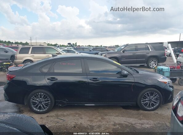 3KPF54AD9PE682690 2023 KIA FORTE Black Սալոնի հետևի տեսք