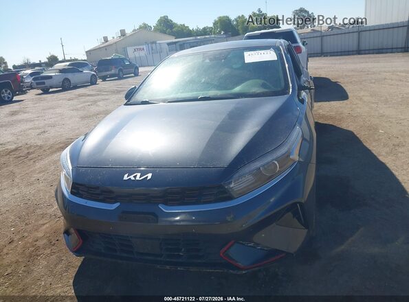 3KPF54ADXPE525301 2023 KIA FORTE Серый Вид задней части салона