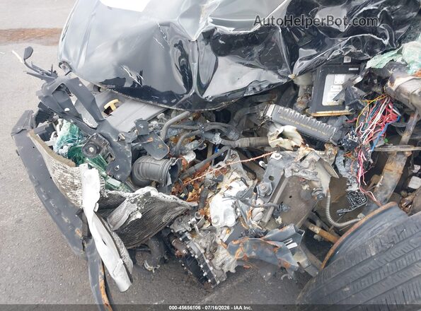 3KPFK4A71HE089894 2017 KIA FORTE Black Rear view