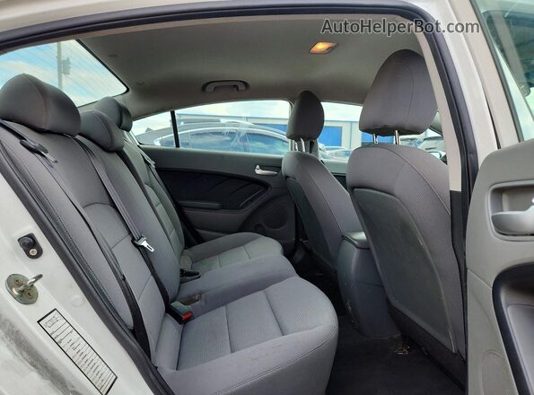 3KPFK4A76JE193223 2018 KIA FORTE White Rear seats view