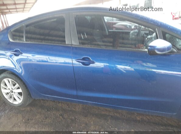 3KPFL4A70HE117309 2017 KIA FORTE Blue უკანა სალონის ხედი