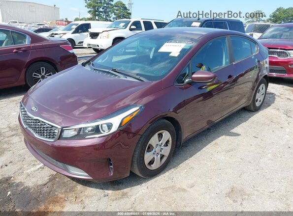 3KPFL4A71HE136998 2017 KIA FORTE Burgundy Առջևի ձախ երեք քառորդ տեսարան