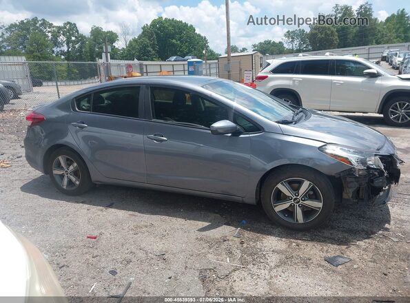 3KPFL4A71JE189349 2018 KIA FORTE Gray უკანა სალონის ხედი