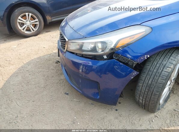 3KPFL4A72HE112032 2017 KIA FORTE Blue Սալոնի հետևի տեսք