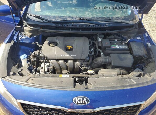 3KPFL4A72JE185553 2018 KIA FORTE Синий Вид задней части салона