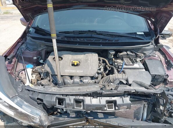 3KPFL4A74HE012949 2017 KIA FORTE Maroon Вид ззаду