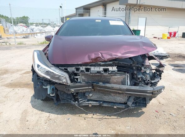 3KPFL4A74HE012949 2017 KIA FORTE Maroon Вид задньої частини салону