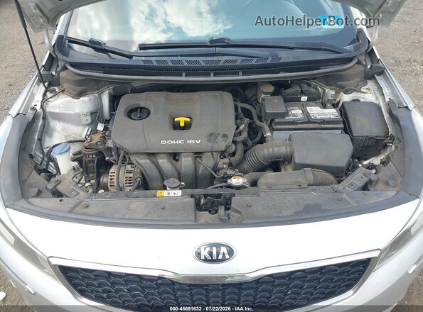 3KPFL4A75HE131982 2017 KIA FORTE Серебряный Вид сзади