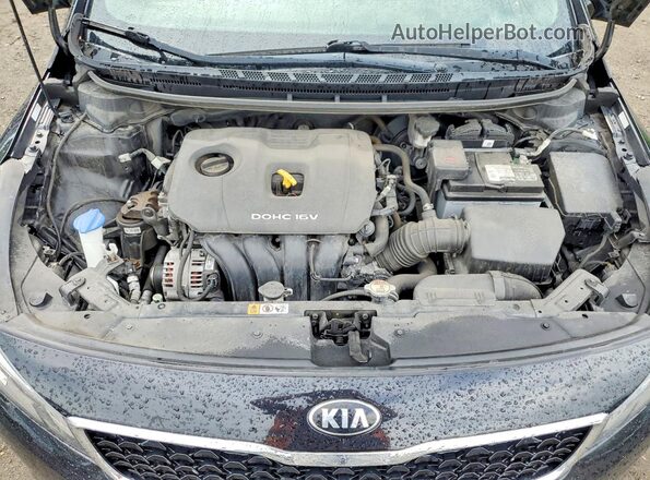 3KPFL4A75JE284285 2018 KIA FORTE Black Вид задньої частини салону