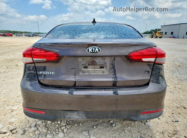 3KPFL4A76HE131957 2017 KIA FORTE Коричневый Вид сзади