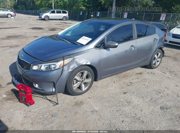 3KPFL4A76JE195535 2018 KIA FORTE Gray წინა მარცხენა ხედი სამი მეოთხედიდან