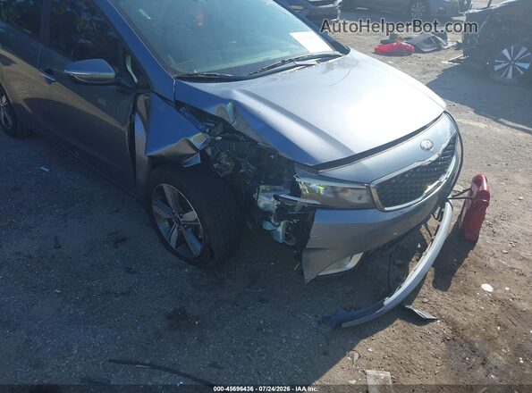3KPFL4A76JE195535 2018 KIA FORTE Gray ხელსაწყოთა პანელის ხედი