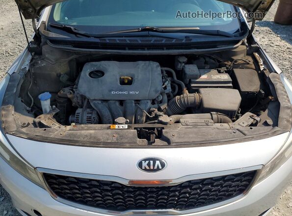 3KPFL4A77HE120675 2017 KIA FORTE Серебряный Вид задней части салона