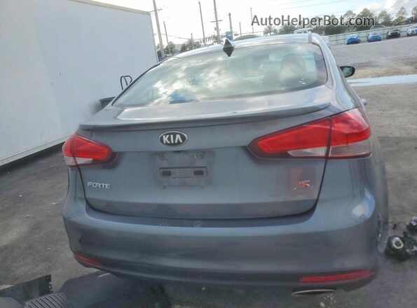 3KPFL4A77JE219504 2018 KIA FORTE Gray უკანა ხედი