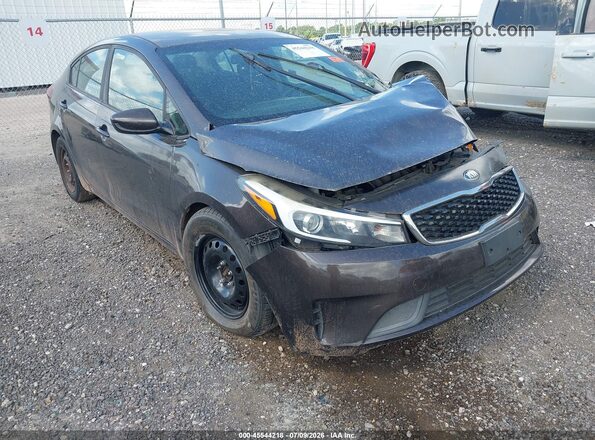 3KPFL4A78HE148792 2017 KIA FORTE Brown Вид задньої частини салону