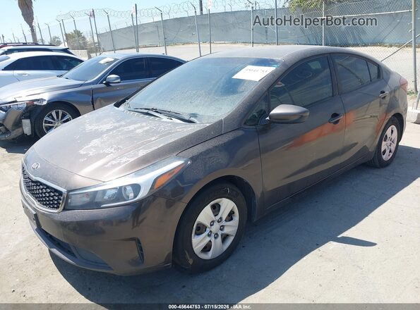 3KPFL4A78JE180809 2018 KIA FORTE Gray Vista tres cuartos delantera izquierda