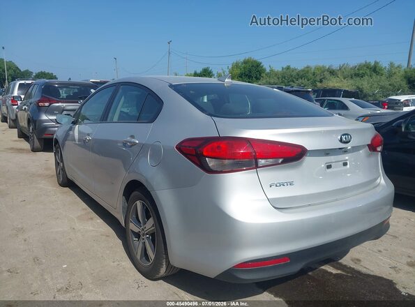3KPFL4A79JE249801 2018 KIA FORTE Silver Rear left