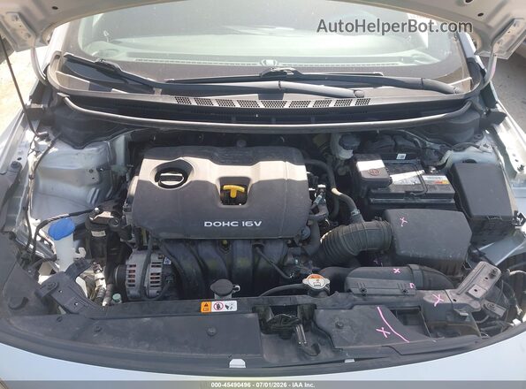 3KPFL4A79JE249801 2018 KIA FORTE Silver Rear view