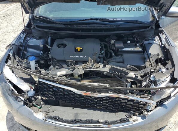 3KPFL4A7XHE098087 2017 KIA FORTE Charcoal Սալոնի հետևի տեսք
