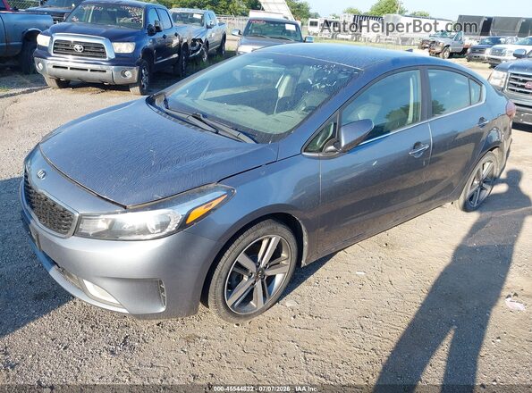 3KPFL4A81HE004770 2017 KIA FORTE Gray წინა მარცხენა ხედი სამი მეოთხედიდან