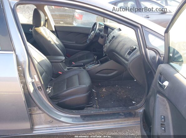 3KPFL4A81HE004770 2017 KIA FORTE Gray წინა სალონის ხედი