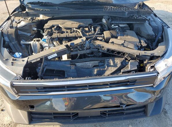 3KPFT4DE0SE150702 2025 KIA K4 Charcoal Вид задньої частини салону