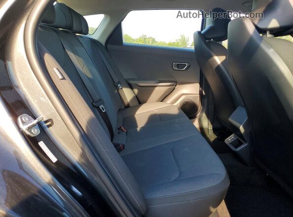 3KPFT4DE0SE150702 2025 KIA K4 Charcoal Вид задніх сидінь