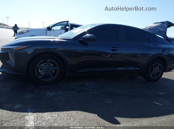 3KPFT4DE0SE252906 2025 KIA K4 Black Սալոնի հետևի տեսք