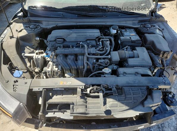 3KPFT4DE4SE033866 2025 KIA K4 Gray Vista interior trasera