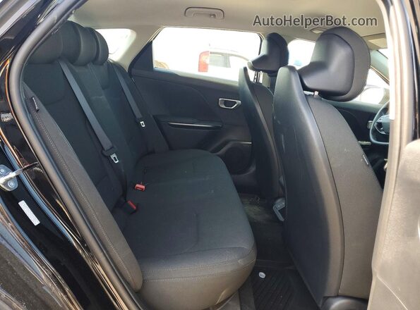 3KPFT4DE5TE279231 2026 KIA K4 Black Vista de los asientos traseros