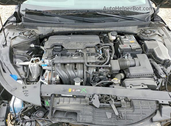 3KPFT4DE7SE181588 2025 KIA K4 Gray Vista interior trasera