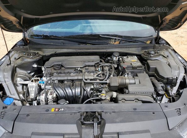 3KPFT4DE7SE227484 2025 KIA K4 Gray Vista interior trasera