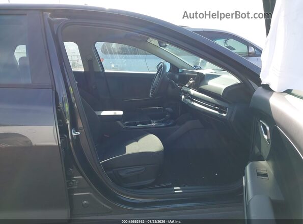 3KPFT4DE7TE315341 2026 KIA K4 Gray Vista interior delantera