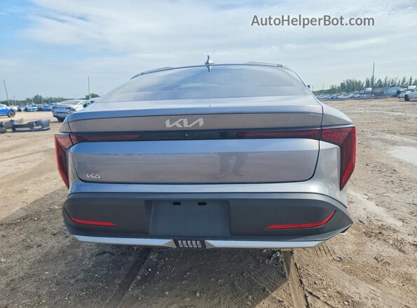 3KPFT4DE8SE094038 2025 KIA K4 Silver Հետևի տեսք