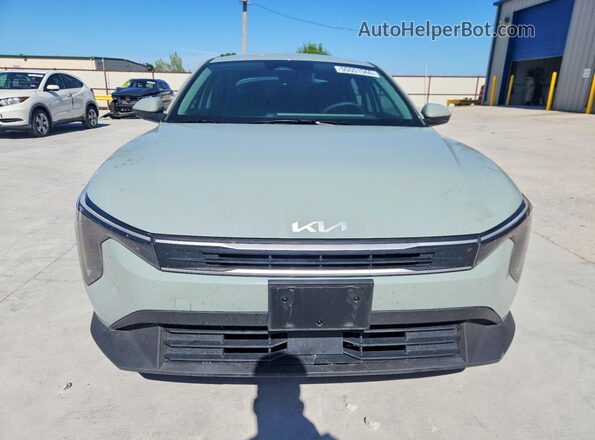 3KPFT4DE9SE010082 2025 KIA K4 Gray Front view