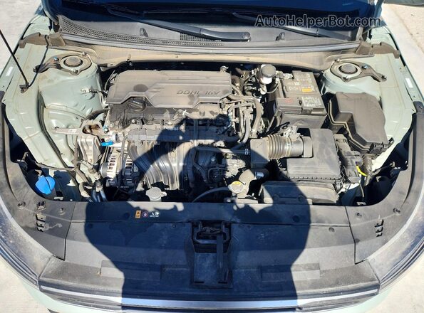 3KPFT4DE9SE010082 2025 KIA K4 Gray Rear interior view