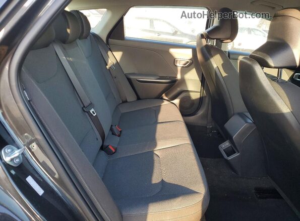 3KPFT4DE9SE180409 2025 KIA K4 Charcoal უკანა სავარძლების ხედი