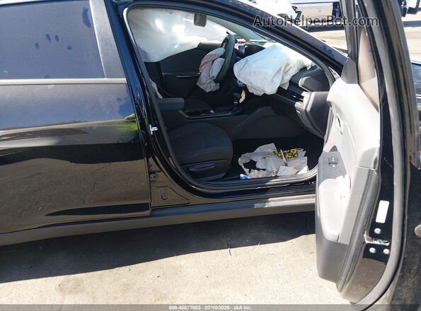 3KPFT4DE9SE216986 2025 KIA K4 Black Widok wnętrza z przodu