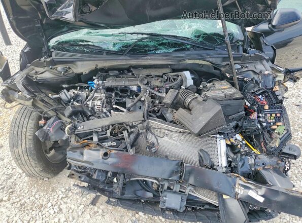 3KPFT4DEXSE110384 2025 KIA K4 Black Սալոնի հետևի տեսք