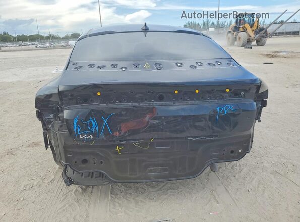 3KPFT4DEXSE119392 2025 KIA K4 Black Widok z tyłu