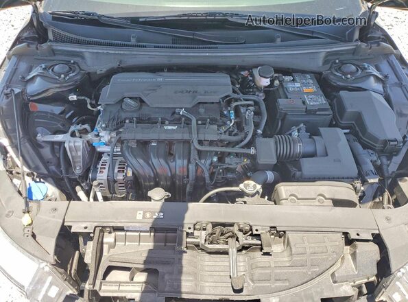 3KPFU4DEXSE137792 2025 KIA K4 Black Rear interior view
