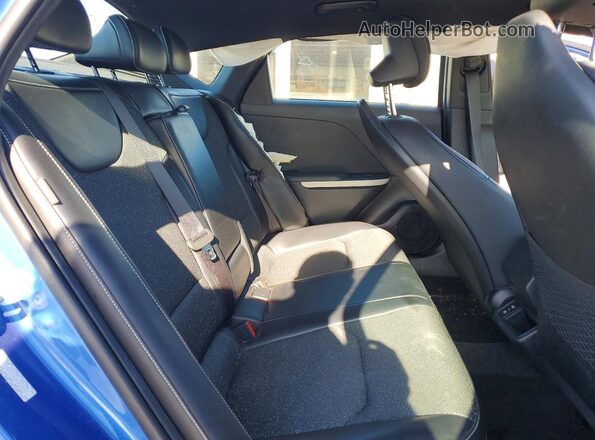 3KPFW4DE0SE080643 2025 KIA K4 Blue Rear seats view