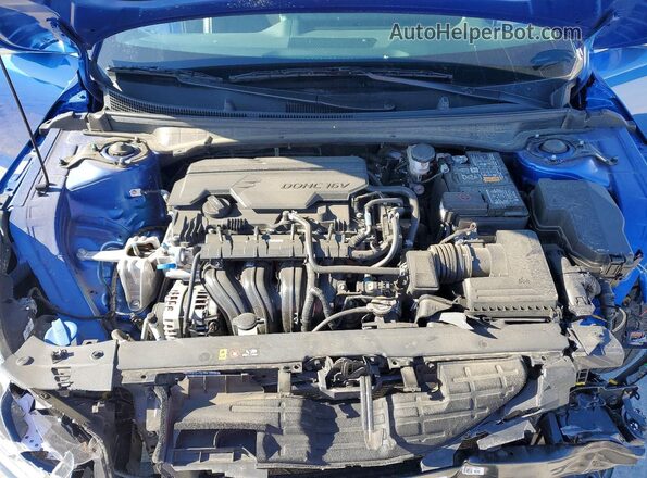 3KPFW4DE0SE080643 2025 KIA K4 Blue Rear interior view