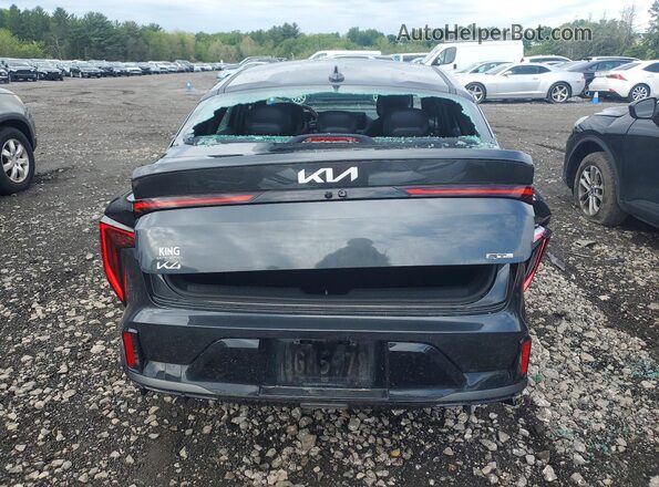 3KPFW4DE1SE035615 2025 KIA K4 Gray Widok z tyłu