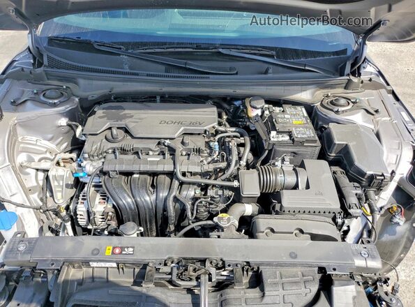 3KPFW4DE6SE176700 2025 KIA K4 Silver Widok wnętrza z tyłu