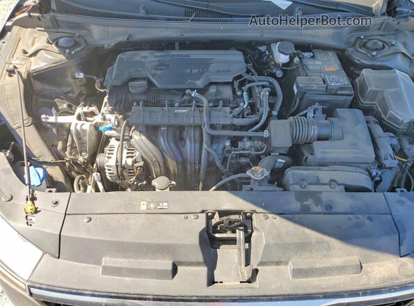 3KPFW4DE8SE102422 2025 KIA K4 Charcoal Widok wnętrza z tyłu