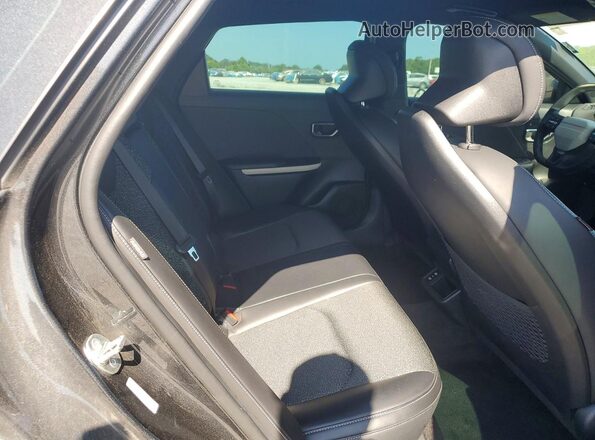 3KPFW4DE8SE102422 2025 KIA K4 Charcoal Widok tylnych siedzeń
