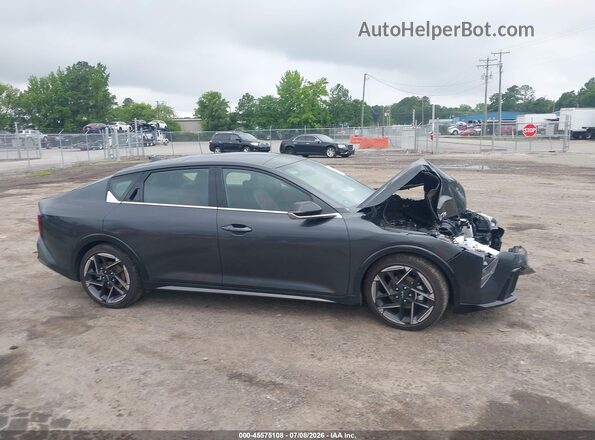 3KPFW4DE8SE215979 2025 KIA K4 Gray Widok wnętrza z tyłu