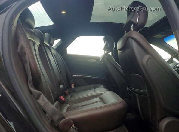 3LN6L2NK9GR608242 2016 LINCOLN MKZ Black Widok tylnych siedzeń